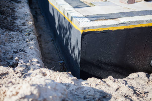 Professional Waterproofing technician working in Windsor, NC